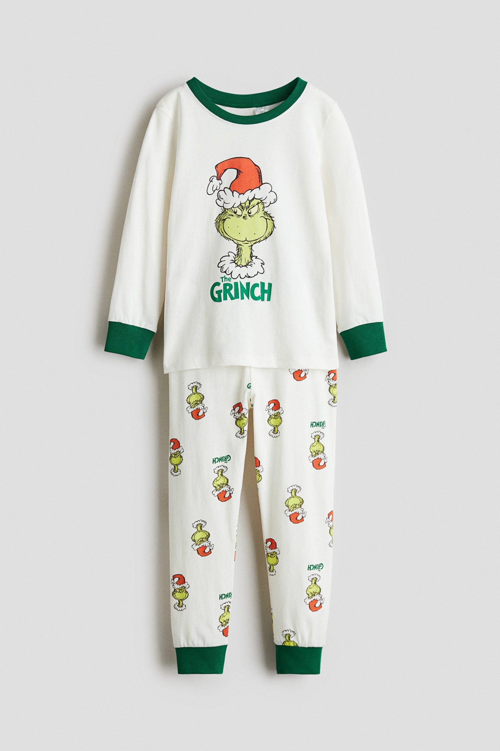 grinch-pyjama-653jqy-1.jpg Pyjama van katoenen tricot met print Wit/De Grinch KINDEREN | H&M NL - Afbeelding 1